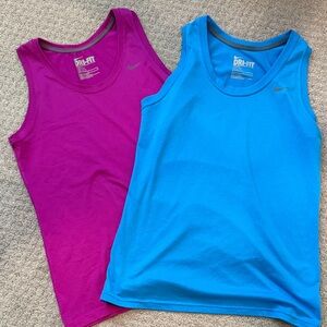 Nike women’s medium Dri-FIT Tank Tops - Magenta and Sky Blue